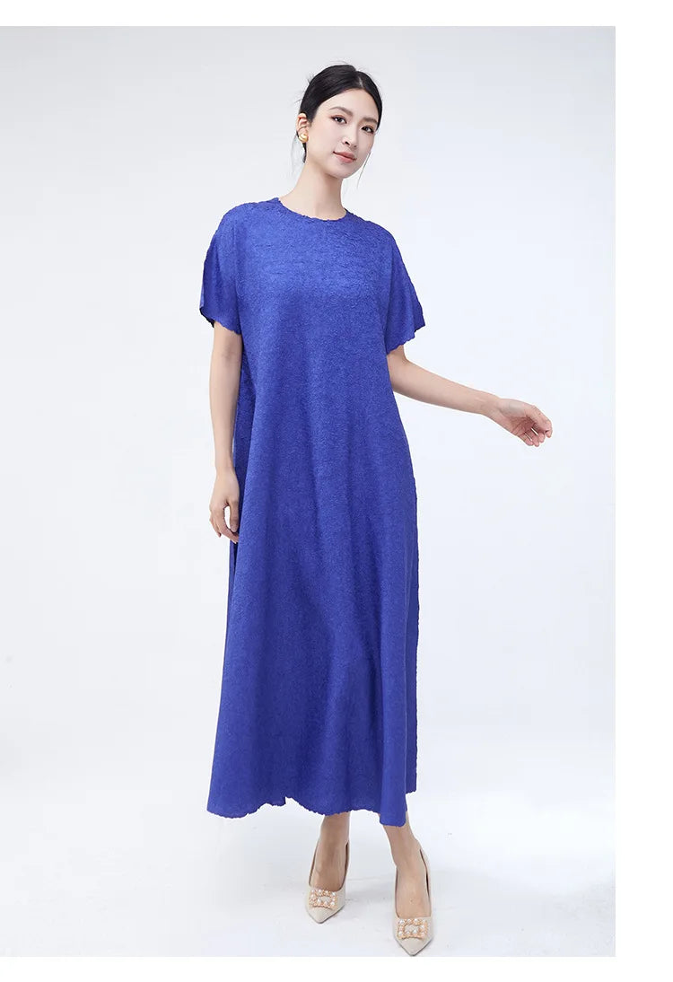 Plus-size women's spring/summer high-end dress, round neck, loose fit, flattering, stylish, versatile, and elegant.